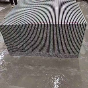 泉州芝麻白毛板荒料切割