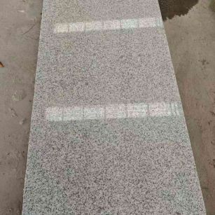 泉州芝麻白光面毛板